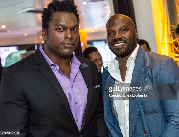 Former NFL PLayer LaVar Arrington D'Quell Jackson attend the Sports Academy Foundation 50 For 50 at Manhattan Country Club on July 13, 2017 in...