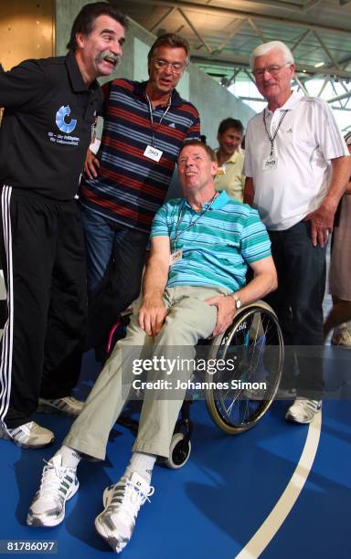 Heiner Brand, headcoach of the German handball national team, Kurt Kluehspies, Joachim Deckarm and former national coach Rudolph Spengler are seen...