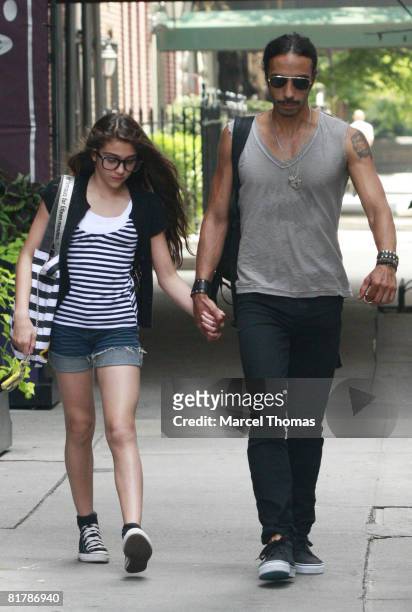 Madonna's daughter Lourdes Leon walks with her father Carlos Leon on the upper west-side of Manhattan on June 30, 2008 in New York City.