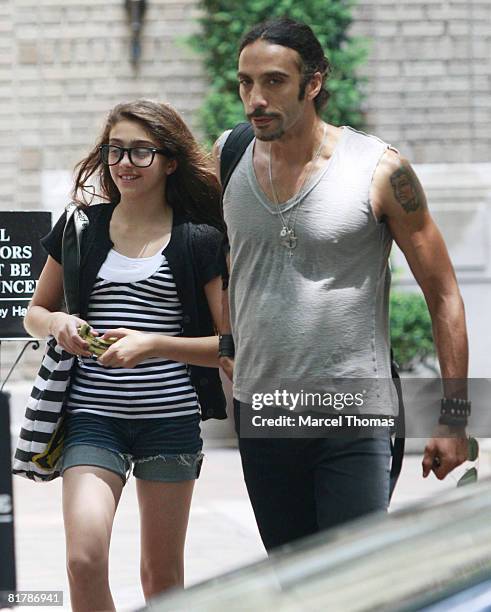 Madonna's daughter Lourdes Leon walks with her father Carlos Leon on the upper west-side of Manhattan on June 30, 2008 in New York City.