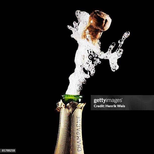 champagne splash - sektkorken stock-fotos und bilder