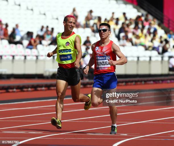 Cristian Valenzuela of China and Guiade Raul Moya and Guida Pedro Garcia Lopez in Men's 1500m T11 Round 1 Heat 1 during IPC World Para Athletics...