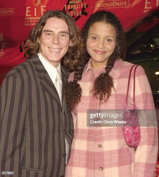 Fashion designer George Blodwell and actress Sydney Tamiia Poitier arrive at Jaguar's Tribute to Style March 18, 2001 in Santa Monica, CA.