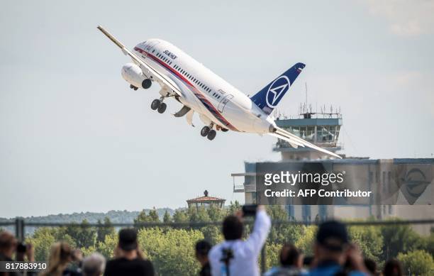 Rusian Sukhoi Superjet 100 airliner takes off for an exhibition flight on July 18, 2017 during the opening day of the annual air show MAKS 2017 in...