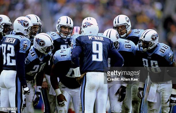 Tennessee Titans quarterback Steve McNair calls a play in the huddle during the AFC Wildcard Playoff, a 22-16 victory over the Buffalo Bills on...