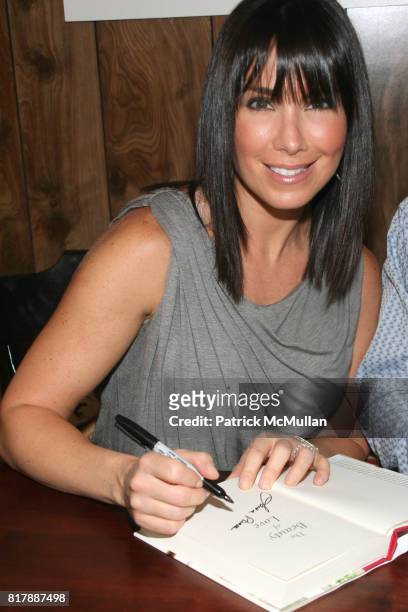 Laura Posada attends Jorge Posada and Laura Posada book signing of "The Beauty of Love" at BookEnds on September 23, 2010.