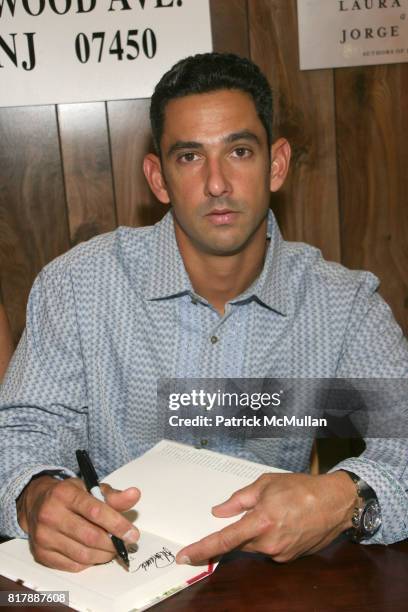 Jorge Posada attends Jorge Posada and Laura Posada book signing of "The Beauty of Love" at BookEnds on September 23, 2010.