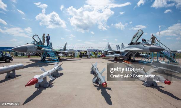 Photo taken on July 18, 2017 shows different missiles that can be attached to Russian war planes presented during the opening day of the annual air...