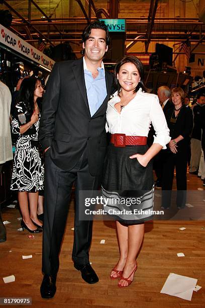 Personalities Carter Oosterhouse and Rachel Ray at the ringing of the opening bell at the New York Stock Exchange on July 1, 2008 in New York City.