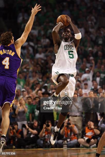 Kevin Garnett of the Boston Celtics shoots a jumper over Luke Walton of the Los Angeles Lakers in Game Six of the 2008 NBA Finals on June 17, 2008 at...