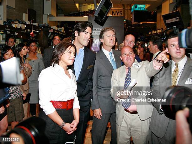 Personalites Rachel Ray and Carter Oosterhouse and Scripps Networks Interactive Chairman, President and CEO Kenneth W. Lowe at the ringing of the...