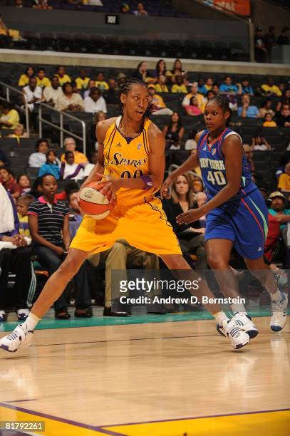 Murriel Page of the Los Angeles Sparks handles the ball against Lisa Willis of the New York Liberty on July 1, 2008 at Staples Center in Los Angeles,...