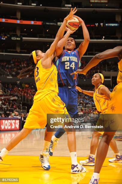 Candace Parker of the Los Angeles Sparks blocks a shot from Erlana Larkins of the New York Liberty on July 1, 2008 at Staples Center in Los Angeles,...