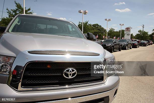 Toyota vehicles sit on the lot of a new-car dealership July 1, 2008 in Park Ridge, Illinois. Toyota car sales fell 9.4 percent in June, its truck...