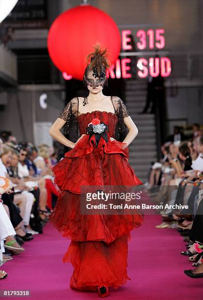Model walks the runway at the Christian Lacroix '09 Autumn-Winter Haute Couture fashion show at the Pompidou Center on July 1, 2008 in Paris, France.
