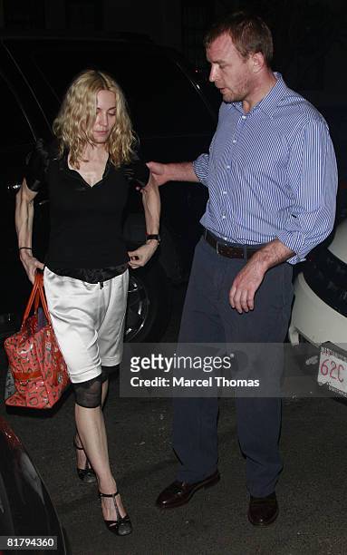 Singer Madonna and husband director Guy Ritchie visit Cesca resturant in Manhattan on July 1, 2008 in New York City.