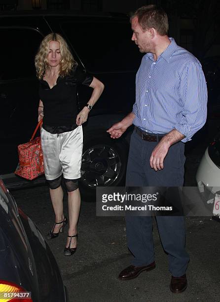 Singer Madonna and husband director Guy Ritchie visit Cesca resturant in Manhattan on July 1, 2008 in New York City.