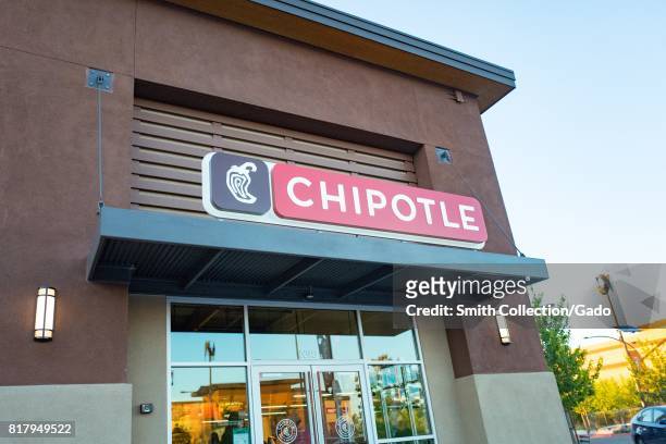 Facade with signage at a local franchise of the Chipotle chain of Mexican restaurants, Dublin, California, July 10, 2017.