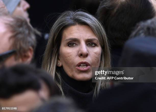 Argentine federal judge Sandra Arroyo Salgado, ex-wife of late Alberto Nisman, special prosecutor of the AMIA case, gestures during the commemoration...
