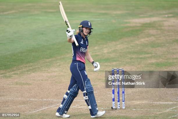 Sarah Taylor of England raises her bat after scoring 50 runs during the Semi-Final ICC Women's World Cup 2017 match between England and South Africa...