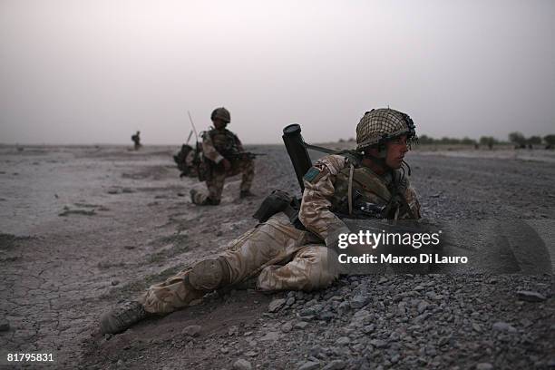 British Paratrooper Pvt. David Kell from Glasgow, of the 3rd Battalion The Parachute Regiment takes part in a an operation to search three compounds...