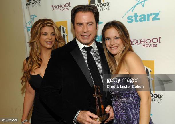 Actress Kirstie Alley, actor John Travolta and actress Kelly Preston backstage at Hollywood Film Festival's Hollywood Awards at the Beverly Hilton...