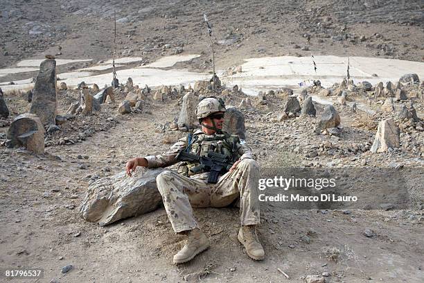 Soldier from the Canadian-led Task Force Kandahar takes part in an operation to search three compounds and look for weapons on July 1, 2008 in...