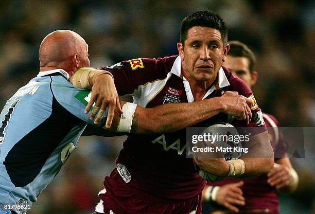 Steven Price of the Maroons takes on the Blues defence during match three of the ARL State of Origin series between the New South Wales Blues and the...