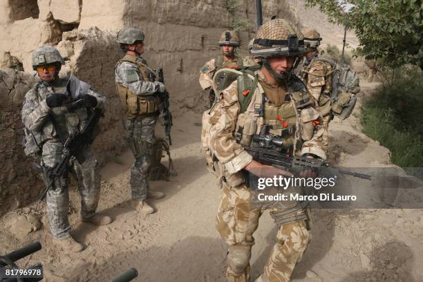 British Paratrooper from the 3rd Battalion The Parachute Regiment Pte Mark Clare, 21-years-old from Welwyn Garden City and Soldiers from the U.S.-led...