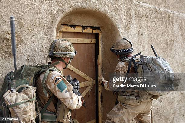 British Paratroopers from the 3rd Battalion The Parachute Regiment take part in an operation to search three compounds and look for weapons on July...