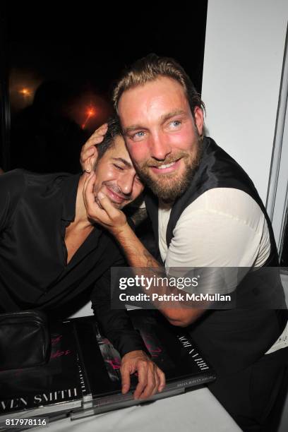 Marc Jacobs and Brian Bowen Smith attend MARC JACOBS Afterparty at Book Marc on September 13, 2010 in New York City.