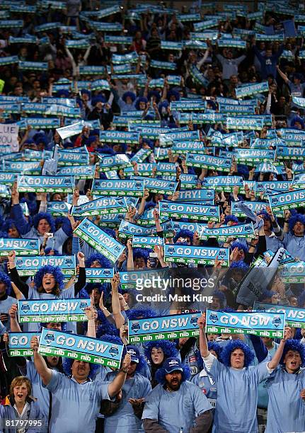 New South Wales Blues fans support their team during match three of the ARL State of Origin series between the New South Wales Blues and the...