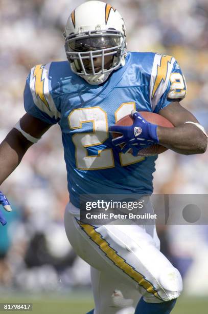 LaDainian Tomlinson, running back for the San Diego Chargers, cuts up field against the Jacksonville Jaguars at Qualcomm Stadium in San Diego on...