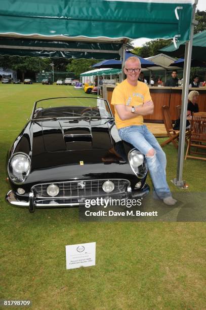 Chris Evans poses with a Ferrari 250 GT Spyder at The "Salon Prive" supercar event launch day to showcase the cars in competition for the Councours...