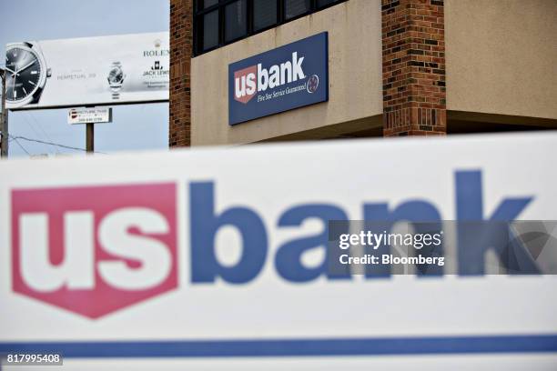 Bancorp signage stands outside a branch in Normal, Illinois, U.S., on Monday, July 10, 2017. US Bancorp is scheduled to release earnings figures on...