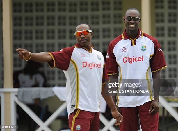 West Indies cricketers Shawn Findlay and Dwayne Bravo during a practice session on July 2, 2008 at Warner Park in Basseterre, Saint Kitts in advance...