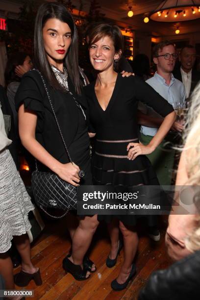 Crystal Renn and Cindi Leivi attend GLAMOUR Welcomes Anne Christensen As New Fashion Director at Peels Restaurant on September 9, 2010 in New York.