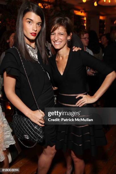 Crystal Renn and Cindi Leivi attend GLAMOUR Welcomes Anne Christensen As New Fashion Director at Peels Restaurant on September 9, 2010 in New York.