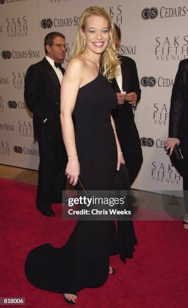 Actress Jeri Ryan arrives at "An Unforgettable Evening" presented by Saks Fifth Avenue benefitting Cedars-Sinai Medical Center March 27, 2001 at the...