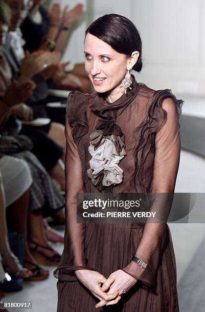 Italian designer Alessandra Facchinetti acknowledges the public at the end of Valentino Fall-Winter 2009 Haute Couture collection show in Paris on...