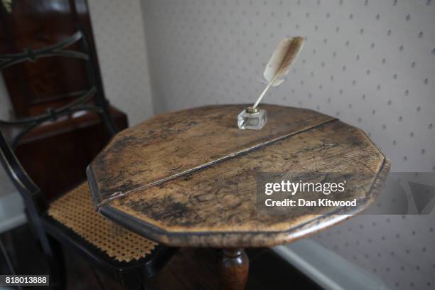 The celebrated late British author Jane Austen's writing table is displayed at her former home on July 18, 2017 in Chawton, England. Jane Austen...