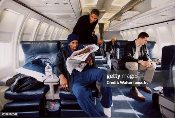 Basketball: Portrait of Los Angeles Lakers Kobe Bryant on airplane, 1/1/2002--3/18/2002