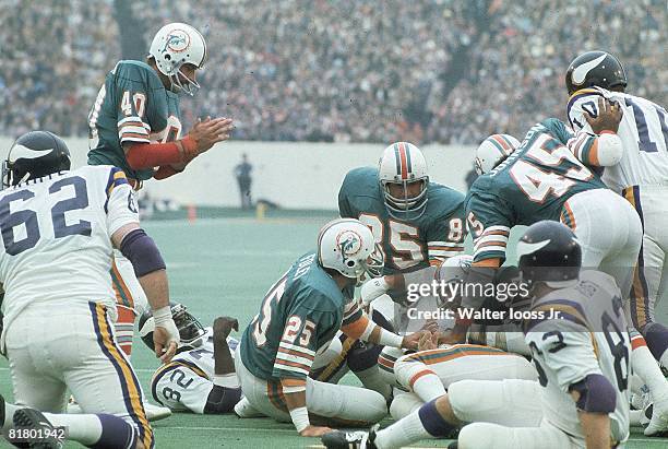 Football: Super Bowl VIII, Miami Dolphins Nick Buoniconti in action during pileup tackle vs Minnesota Vikings, Houston, TX 1/13/1974