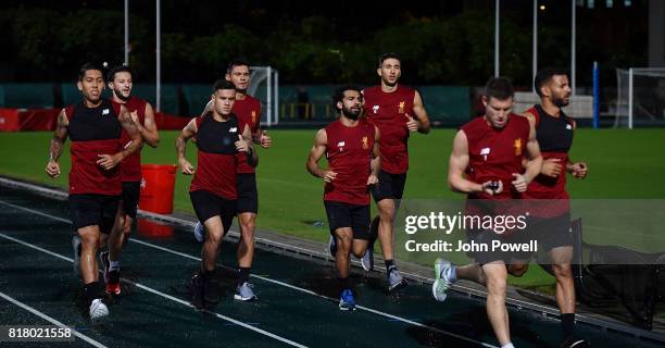 Adam Lallana, Roberto Firmino, Philippe Coutinho, Marko Grujic, Dejan Lovren, Mohamed Salah James Milner and Kevin Stewart of Liverpool during a...