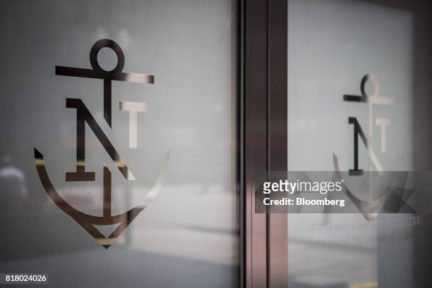 Northern Trust Corp. Logos are displayed on the exterior of a branch in Chicago, Illinois, U.S, on Thursday, July 13, 2017. Northern Trust Corp. Is...