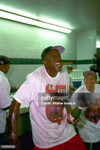 Basketball: NBA finals, Closeup of Chicago Bulls Michael Jordan victorious, smoking cigar in hotel after winning game and championship vs Utah Jazz,...