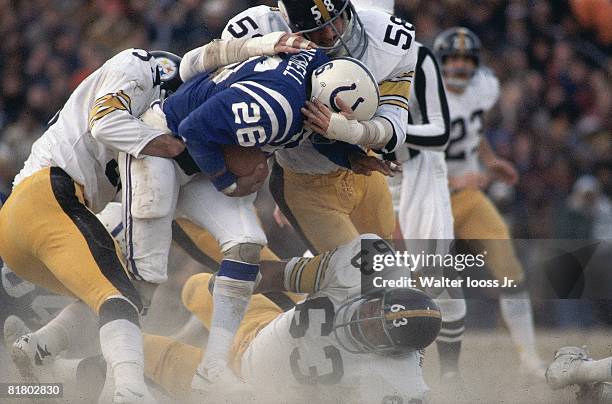 Football: Baltimore Colts Lydell Mitchell in action during tackle vs Pittsburgh Steelers Jack Lambert and Ernie Holmes , Baltimore, MD
