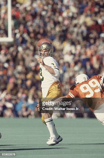 College Football: Cotton Bowl, Notre Dame QB Joe Montana in action, making pass vs Texas Steve McMichael , Dallas, TX 1/2/1978
