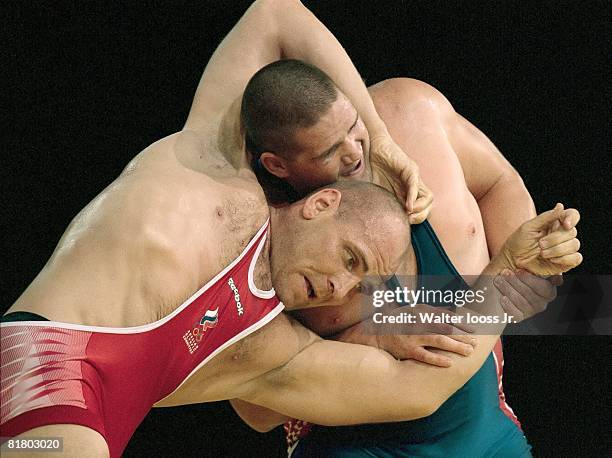 Wrestling: 2000 Summer Olympics, Closeup of RUS Alexandre Kareline in action vs USA Rulon Gardner during Greco-Roman match, Sydney, AUS 9/27/2000