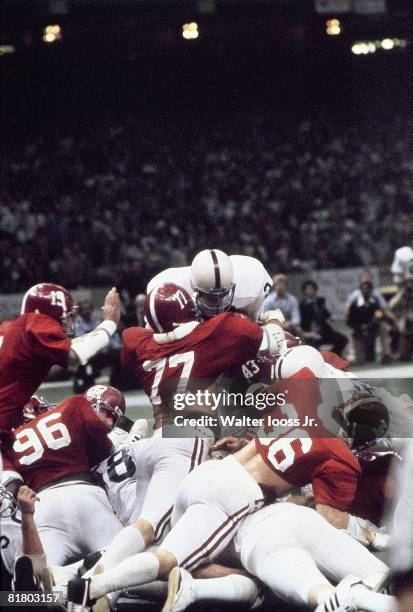 College Football: Sugar Bowl, Penn State Mike Guman in action, attempting 4th down TD vs Alabama Barry Krauss , Murray Legg , and Rich Wingo during...